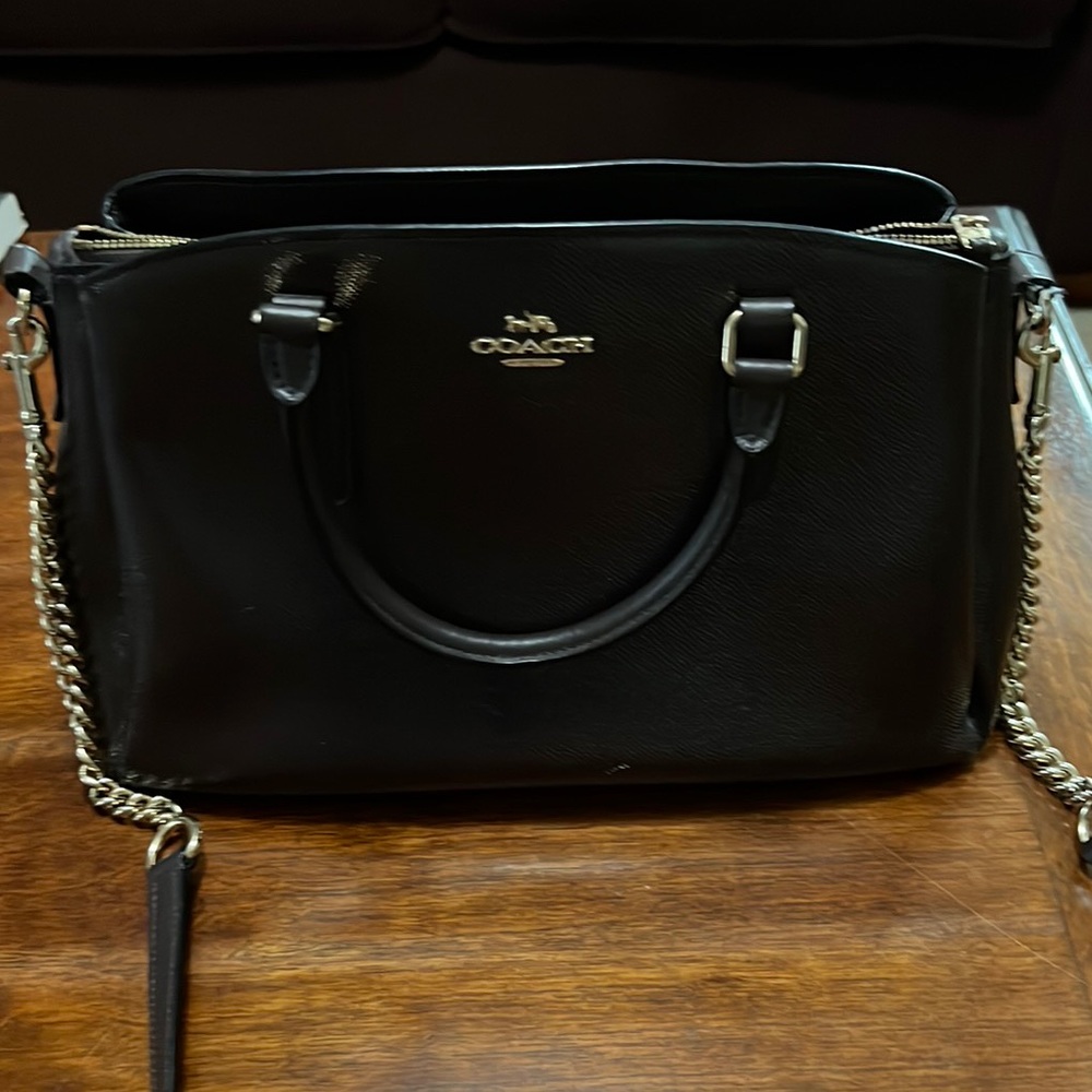 Slightly used Coach burgundy leather purse.